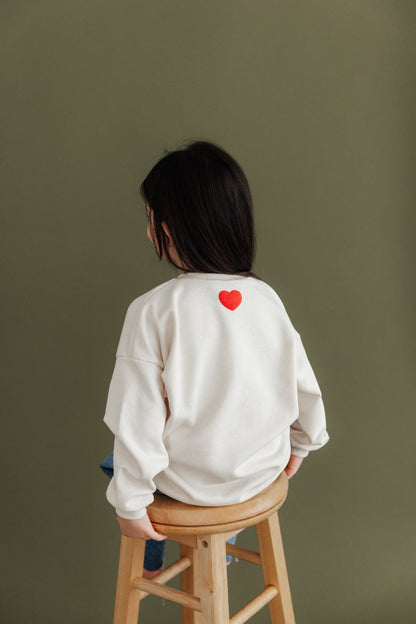Oversized Kinder - Sweater aus Bio - French Terry mit Stickerei „Amore" - Loewenknopf
